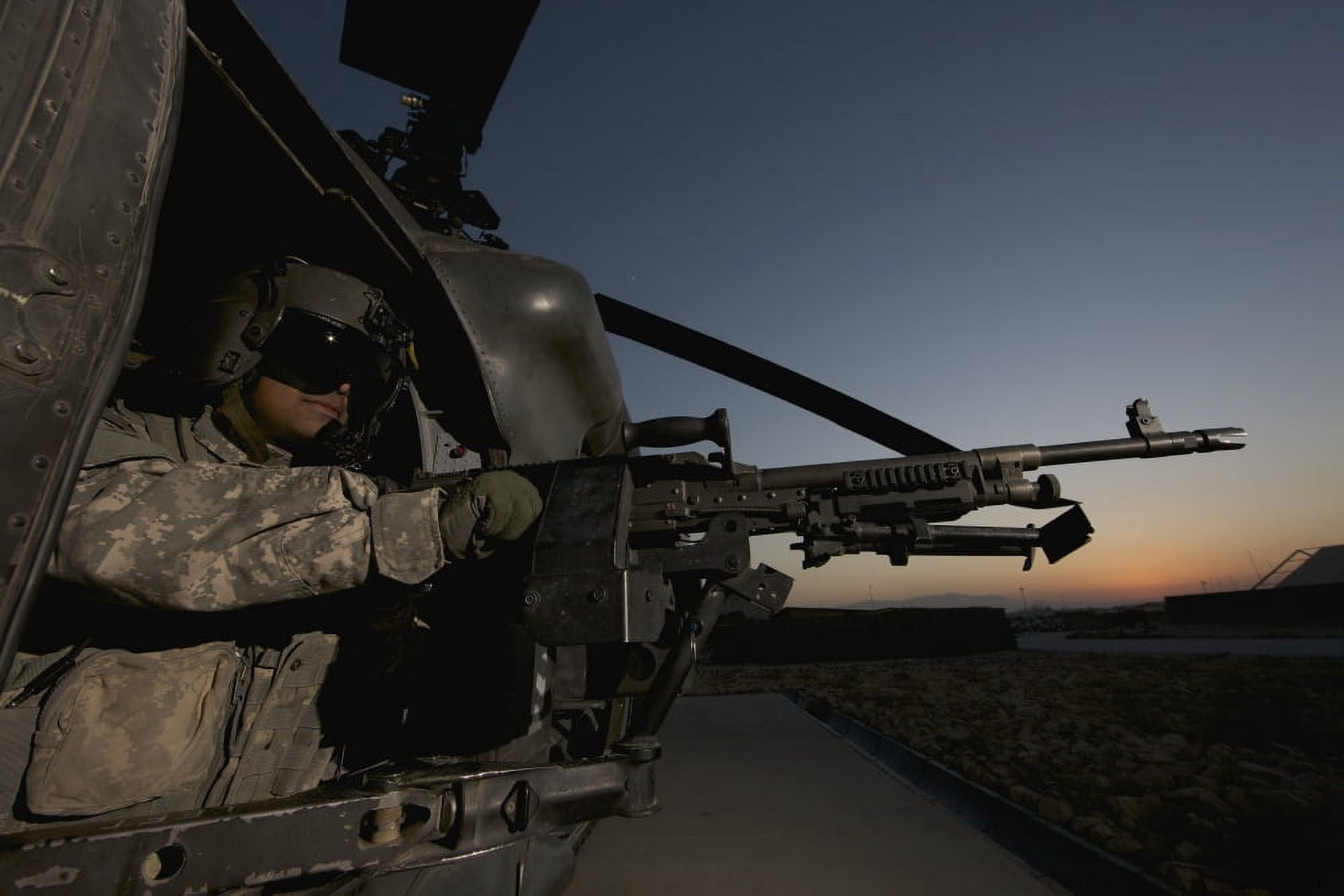 A UH-60L Blackhawk door gunner mans a M-240G machine gun Canvas Art - Terry MooreStocktrek Images (18 x 12)