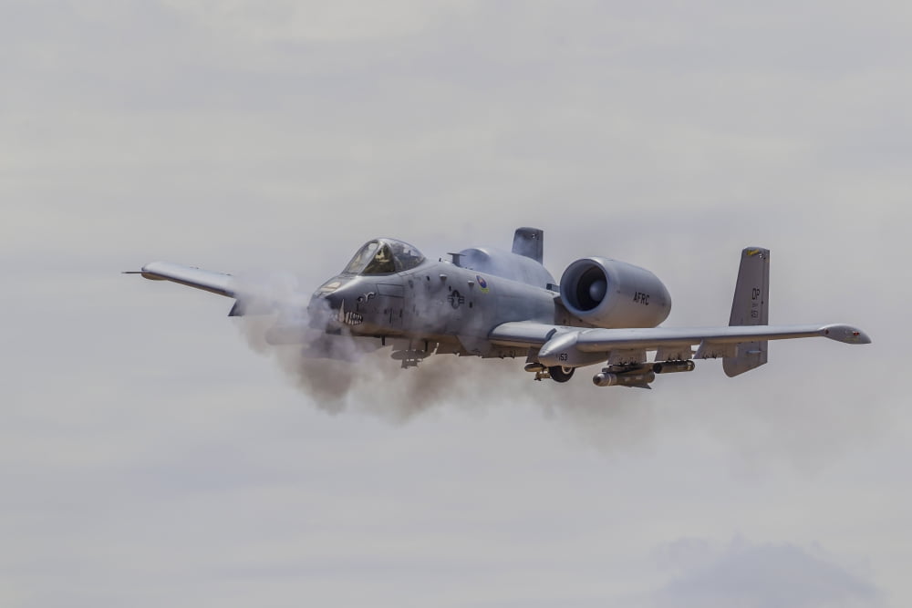 A US Air Force A-10 Thunderbolt II fires its 30mm cannon Canvas Art - Rob EdgcumbeStocktrek Images (18 x 12)