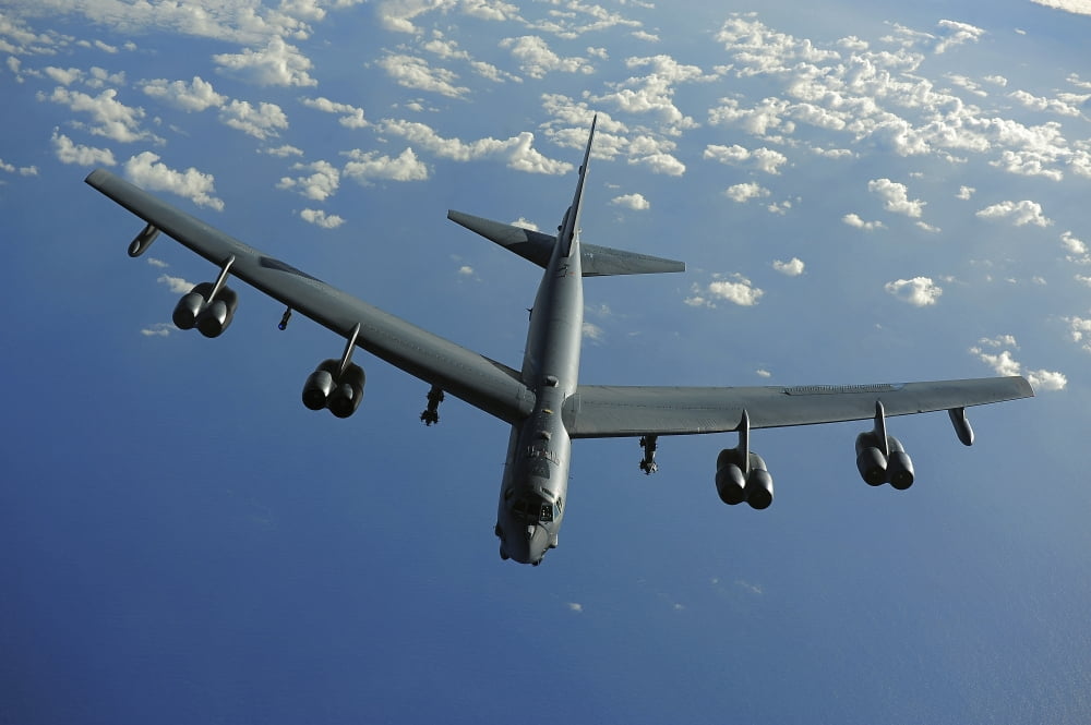 A US Air Force B-52 Stratofortress flies a mission over the Pacific Ocean Canvas Art - Stocktrek Images (34 x 23)