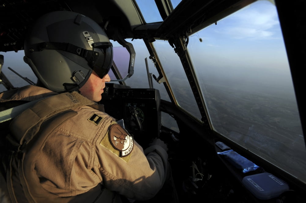 A US Air Force C-130J Hercules pilot flies a mission over Afghanistan Canvas Art - Stocktrek Images (35 x 23)