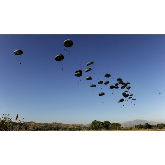 A US Air Force C-17 Globemaster III airdrops pallets to Mirebalais Haiti Canvas Art - Stocktrek Images (37 x 22)