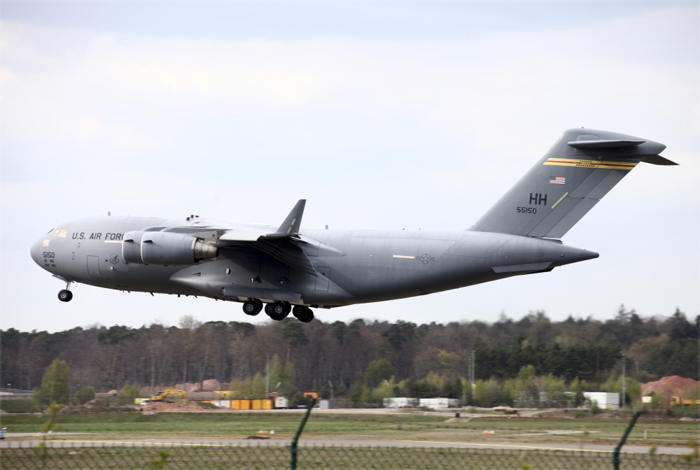 A US Air Force C-17A Globemaster landing at Ramstein Air Base Canvas Art - Timm ZiegenthalerStocktrek Images (17 x 12)