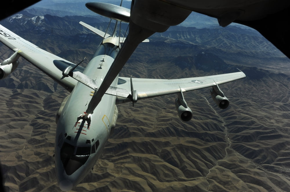 A US Air Force E-3 Sentry aircraft refueling from a KC-10 Extender Canvas Art - Stocktrek Images (35 x 23)
