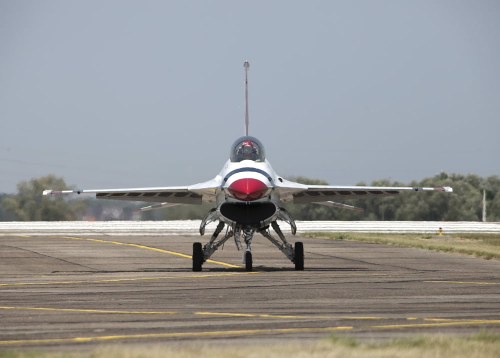 A US Air Force F-16 Thunderbird jet taxiing on the flight line Canvas Art - Timm ZiegenthalerStocktrek Images (17 x 12)