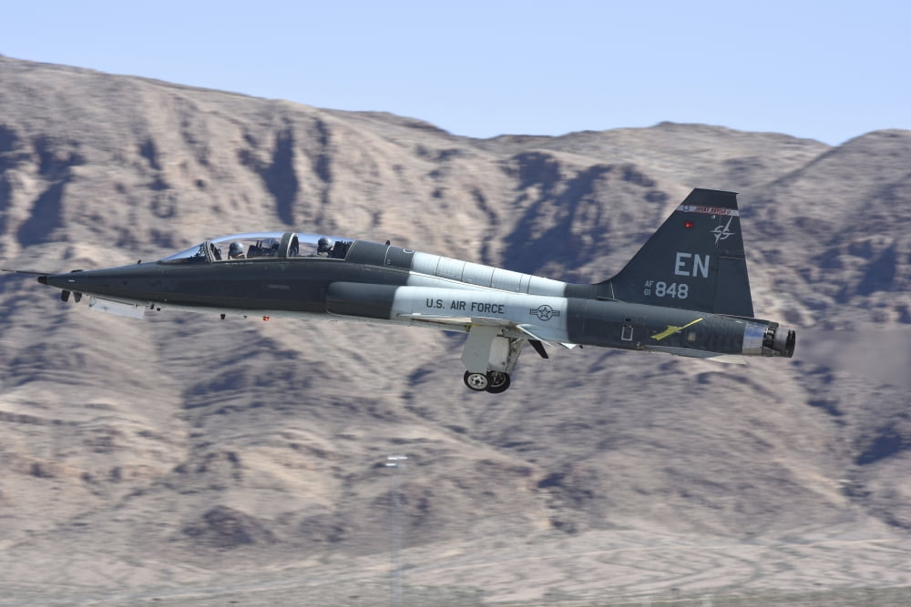 A US Air Force T-38C taking off from Nellis Air Force Base Nevada Canvas Art - Riccardo NiccoliStocktrek Images (34 x 23)