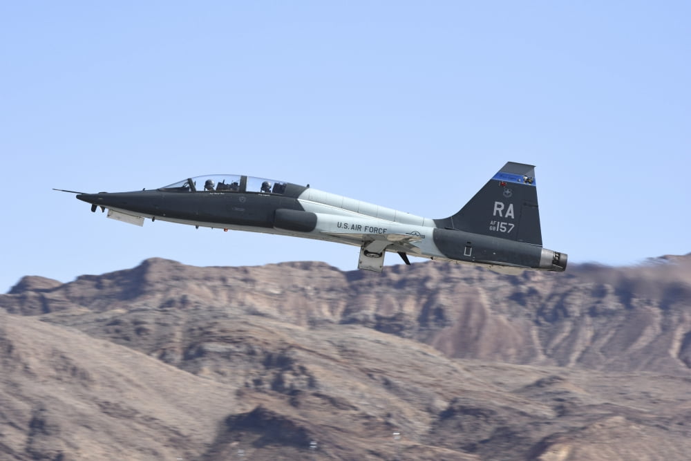 A US Air Force T-38C taking off from Nellis Air Force Base Nevada Canvas Art - Riccardo NiccoliStocktrek Images (34 x 23)