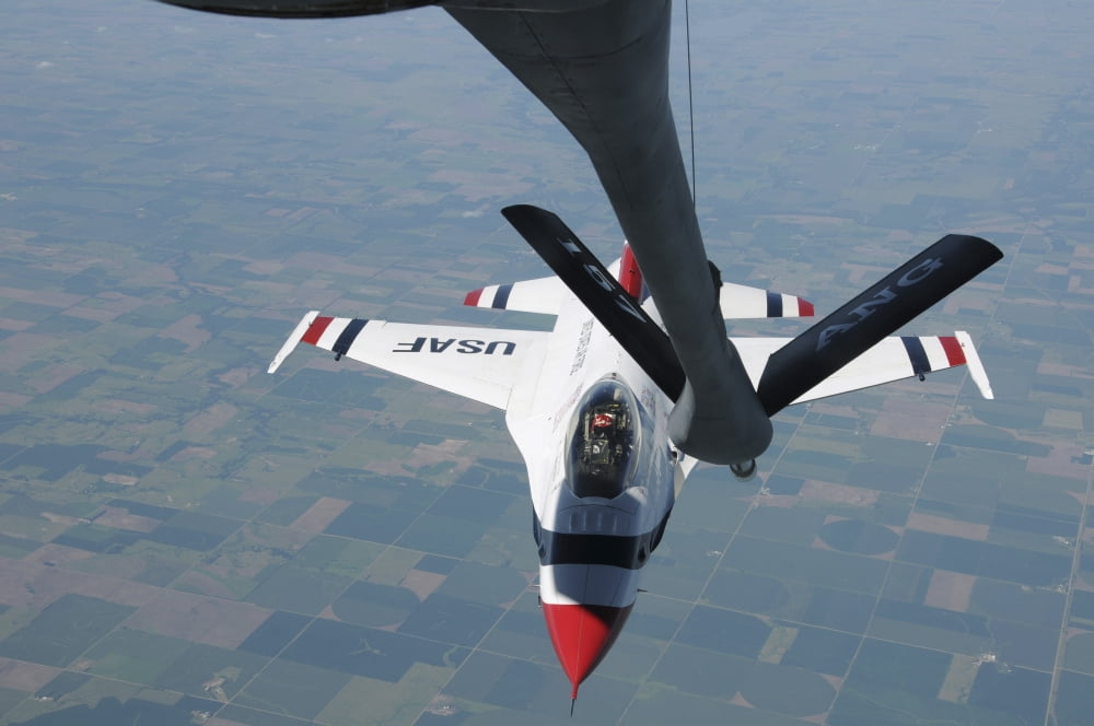 A US Air Force Thunderbird pilot manevurs his F-16 Fighting Falcon towards a refueling boom Canvas Art - Stocktrek Images (35 x 23)
