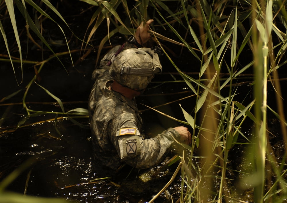 A US Army Soldier searches for missing Soldiers Canvas Art - Stocktrek Images (33 x 23)