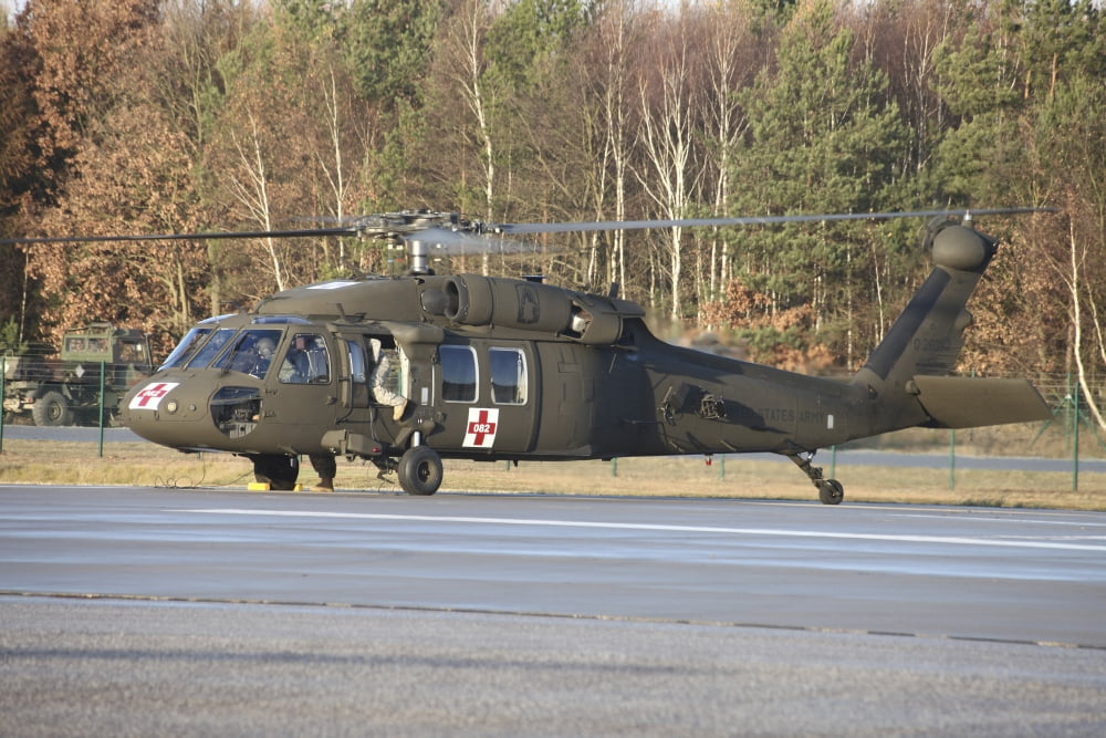 A US Army UH-60L Blackhawk at the Letzlingen Army Training Center Germany Canvas Art - Timm ZiegenthalerStocktrek Images (18 x 12)