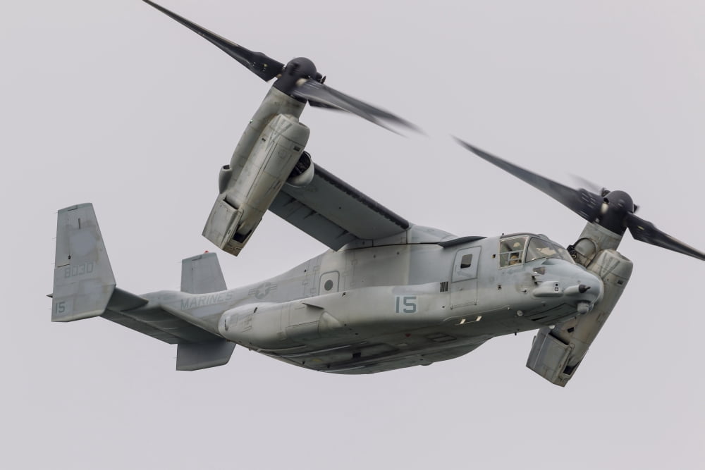 A US Marine Corps V-22 Osprey flies over San Francisco Bay California Canvas Art - Rob EdgcumbeStocktrek Images (17 x 12)