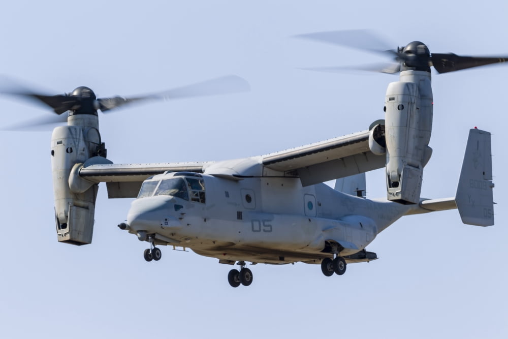 A US Marine Corps V-22 Osprey hovers over Santa Rosa California Canvas Art - Rob EdgcumbeStocktrek Images (34 x 23)