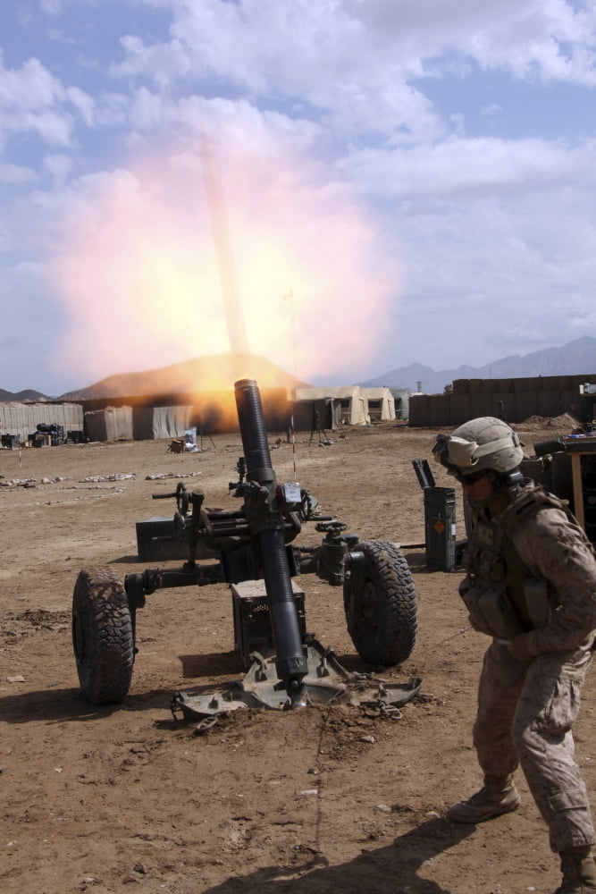 A US Marine Corps gunner fires a 120mm Mortar Canvas Art - Stocktrek Images (23 x 34)