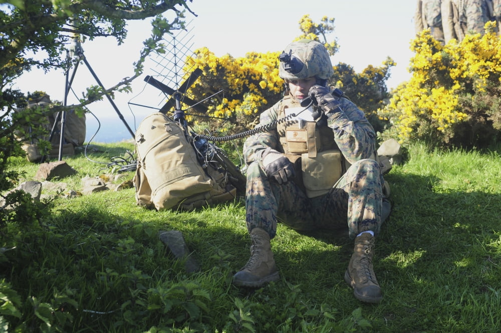 A US Marine communicates to the British Army on a satellite radio Canvas Art - Andrew ChittockStocktrek Images (34 x 23)