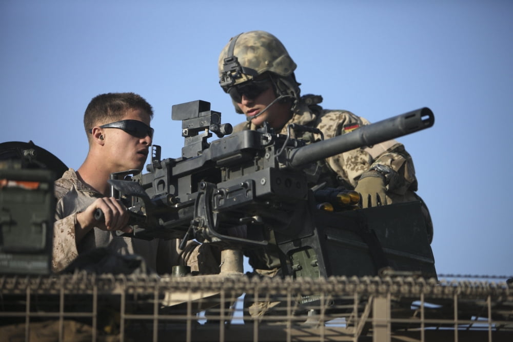 A US Marine fires a GMG automatic grenade launcher Canvas Art - Terry MooreStocktrek Images (35 x 24)