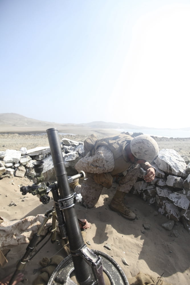A US Marine fires a mortar round Canvas Art - Stocktrek Images (23 x 34)