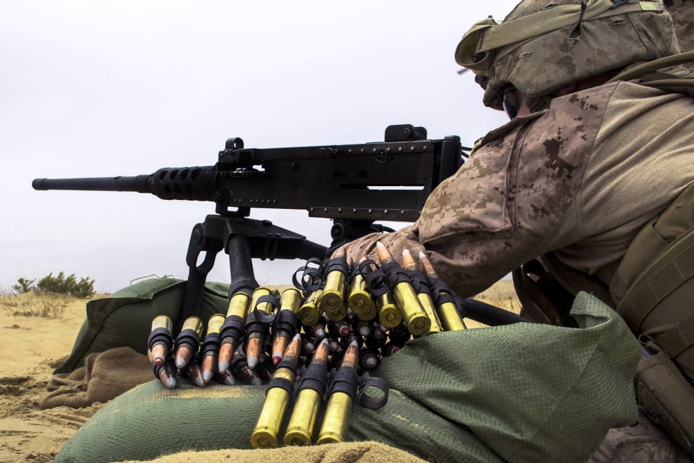 A US Marine fires an M2 50 caliber machine gun Canvas Art - Stocktrek Images (35 x 23)