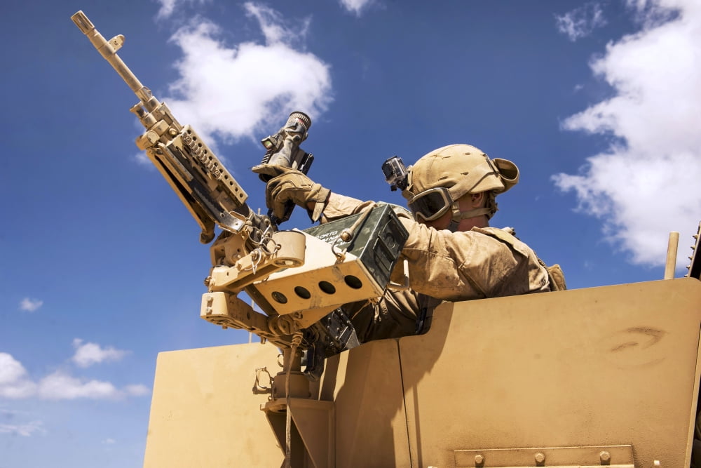 A US Marine inspects his weapon Canvas Art - Stocktrek Images (34 x 23)