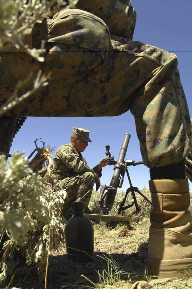 A US Marine mortarman trains on an M-224 mortar system during Javelin Thrust 2010 Canvas Art - Stocktrek Images (23 x 34)