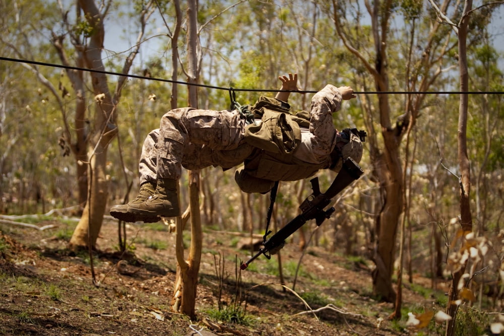 A US Marine participates in a gorge crossing demonstration Canvas Art - Stocktrek Images (35 x 23)
