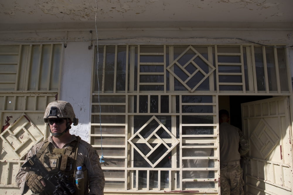 A US Marine provides security at Forward Operating Base Musa Qala Canvas Art - Stocktrek Images (34 x 23)