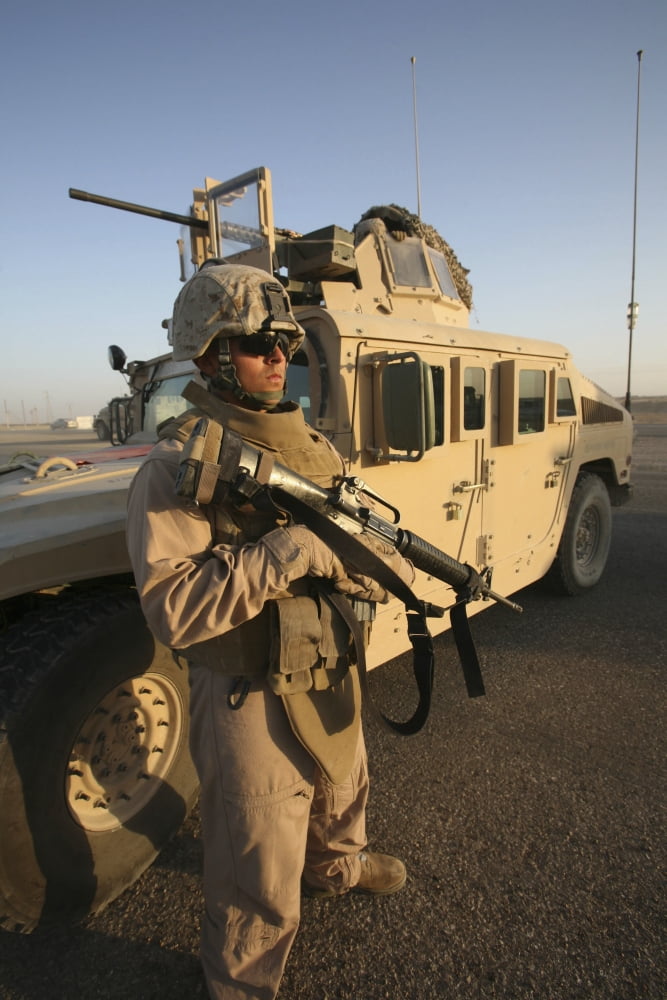 A US Marine providing security during a stop outside of Camp Taqaddum Iraq Canvas Art - Stocktrek Images (23 x 34)