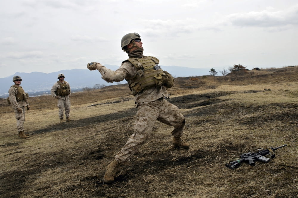 A US Marine throws an M-67 training grenade Canvas Art - Stocktrek Images (35 x 24)