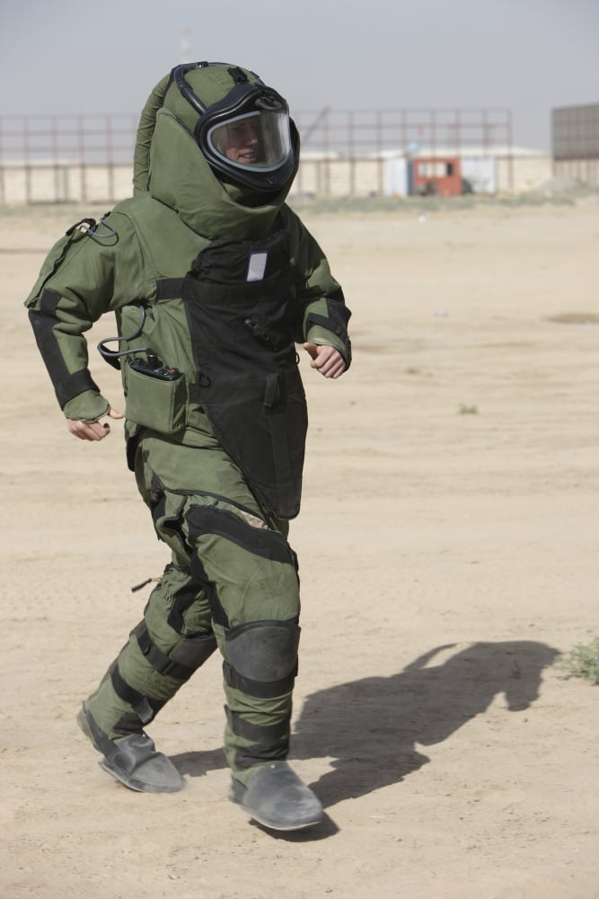 A US Marine tries running in a bomb suit Canvas Art - Terry MooreStocktrek Images (24 x 35)
