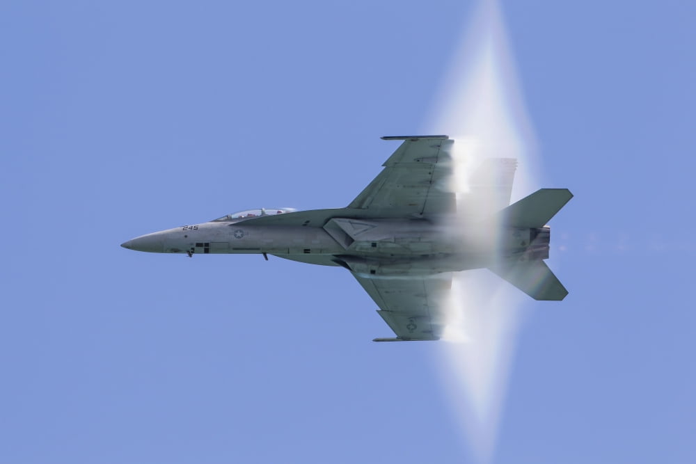 A US Navy FA-18F Super Hornet flies by at high transonic speed Canvas Art - Rob EdgcumbeStocktrek Images (17 x 12)