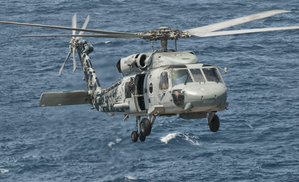 A US Navy SH-60F Seahawk flying off the coast of Pakistan Canvas Art - Giovanni CollaStocktrek Images (36 x 22)