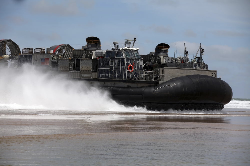 A US Navy landing craft air cushion glides onto a Moroccan beach Canvas Art - Stocktrek Images (35 x 23)