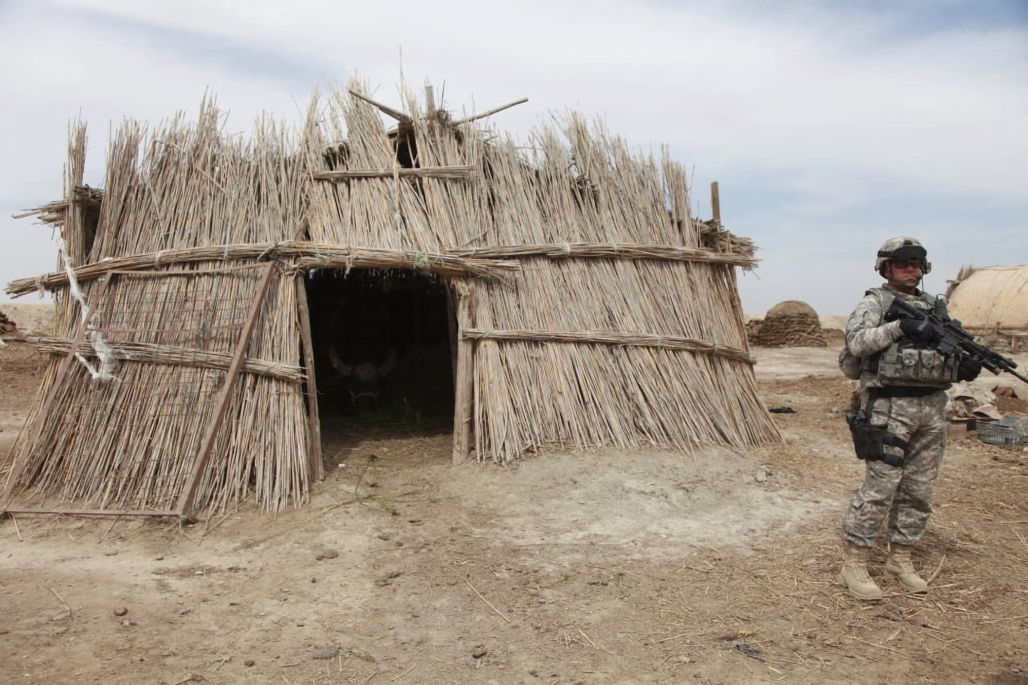 A US Soldier provides security in the village of Al Kuthra Iraq Canvas Art - Stocktrek Images (34 x 23)