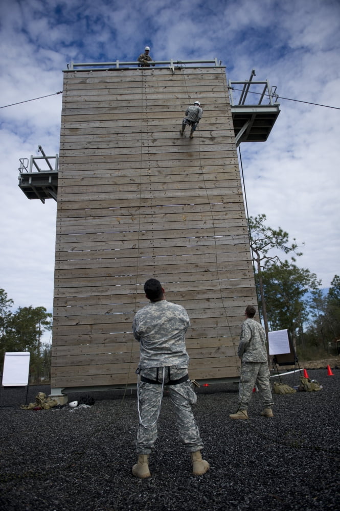 A US Soldier rappels down a 40-foot training tower Canvas Art - Stocktrek Images (23 x 34)