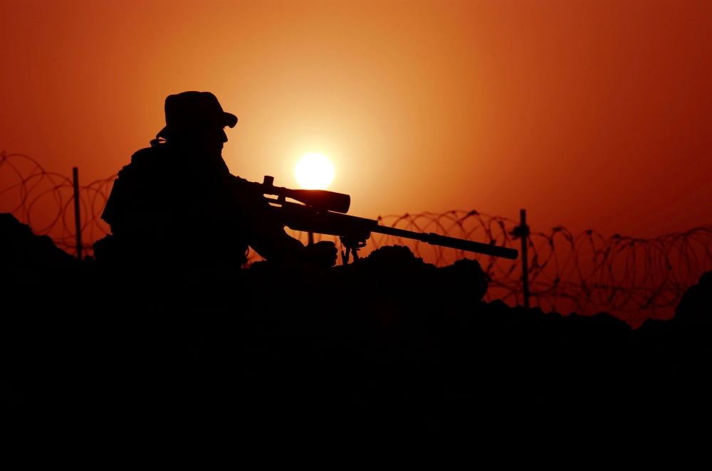 A US Special Forces soldier armed with a Mk-12 Sniper Rifle at sunset Canvas Art - Stocktrek Images (34 x 23)