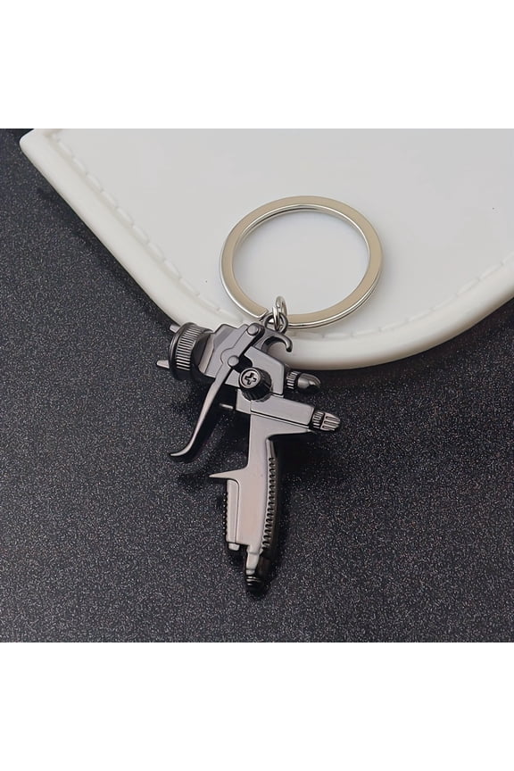 A Unique And Creative Golden Water Gun Keychain With Colorful Key Ring Pendant, Three-dimensional Golden Keychain Pendant.