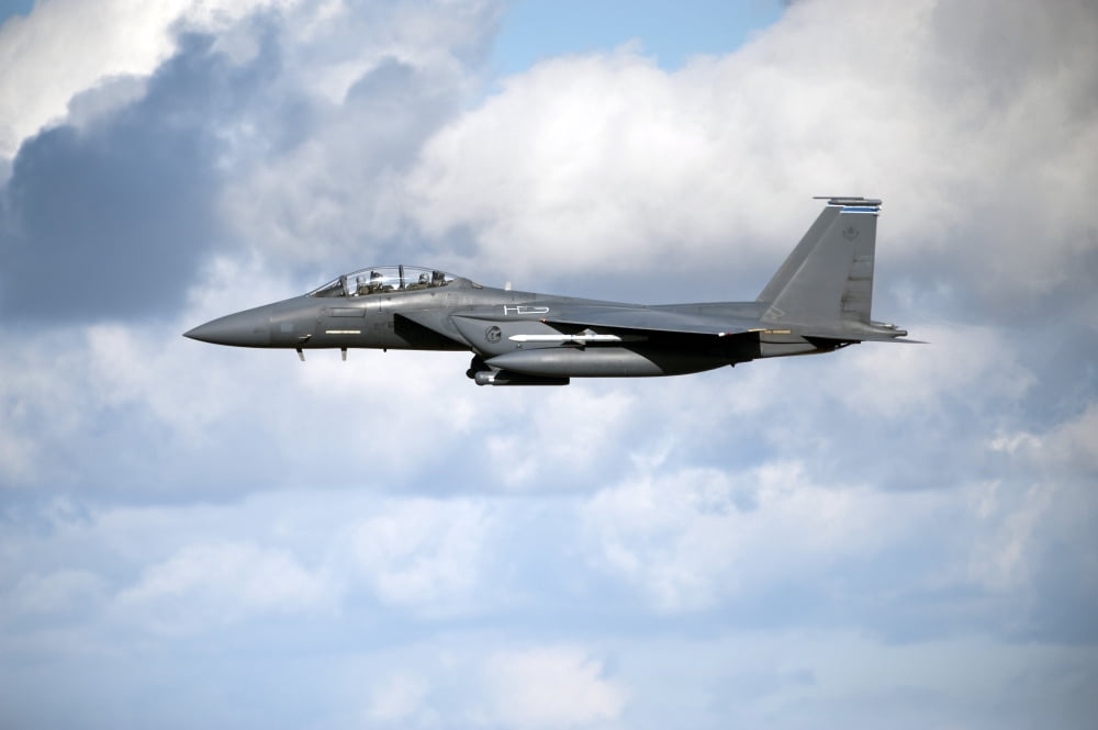 A United States Air Force F-15 Strike Eagle in flight Canvas Art - Andrew ChittockStocktrek Images (34 x 23)