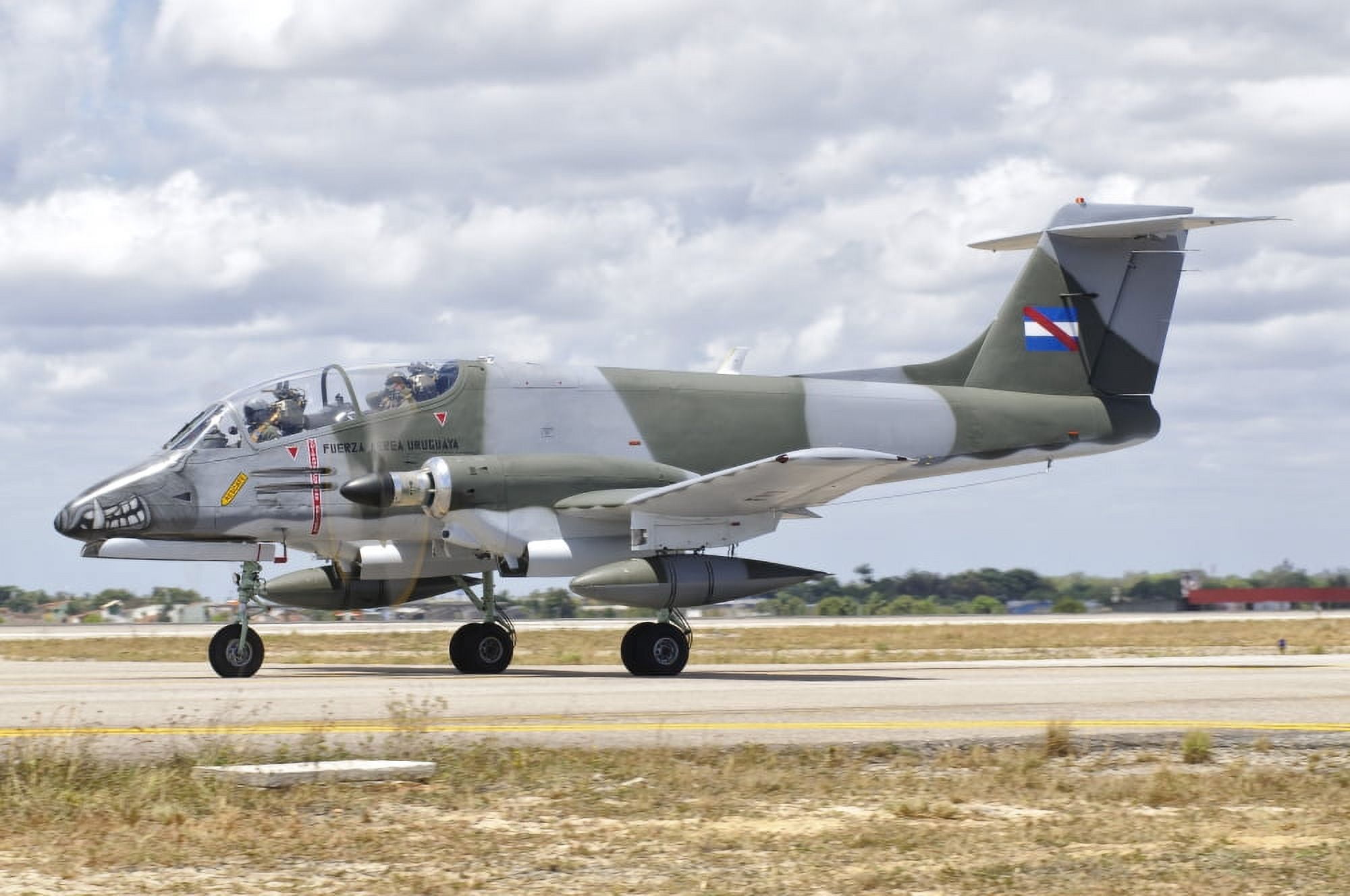 A Uruguayan Air Force IA-58 Pucara at Natal Air Force Base Brazil Canvas Art - Giovanni CollaStocktrek Images (18 x 12)