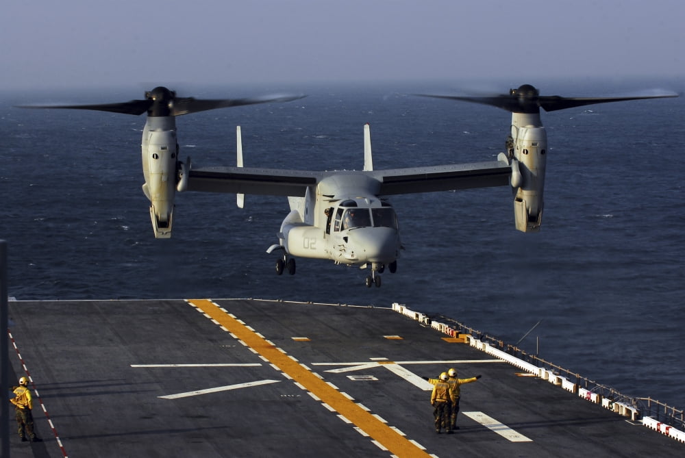 A V-22 Osprey aircraft prepares to land aboard the USS Bataan in the Atlantic Ocean Canvas Art - Stocktrek Images (34 x 23)