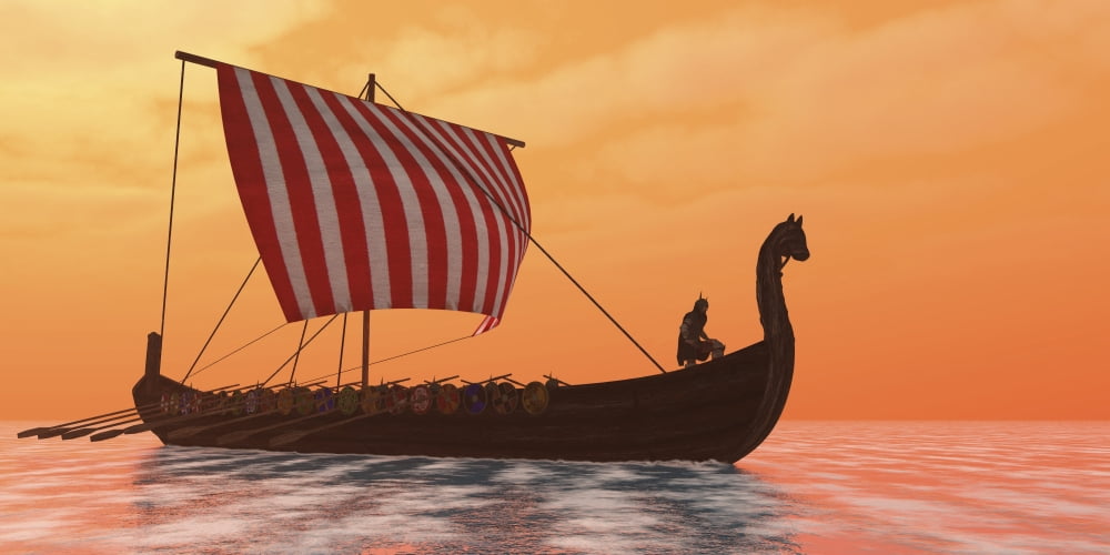 A Viking longboat sails through calm ocean waters Canvas Art - Corey FordStocktrek Images (20 x 10)
