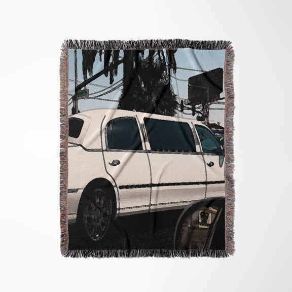 A White Stretch Limousine In Las Vegas Driving Down The Famous Boulevard Finished In Fresco, Woven Blanket