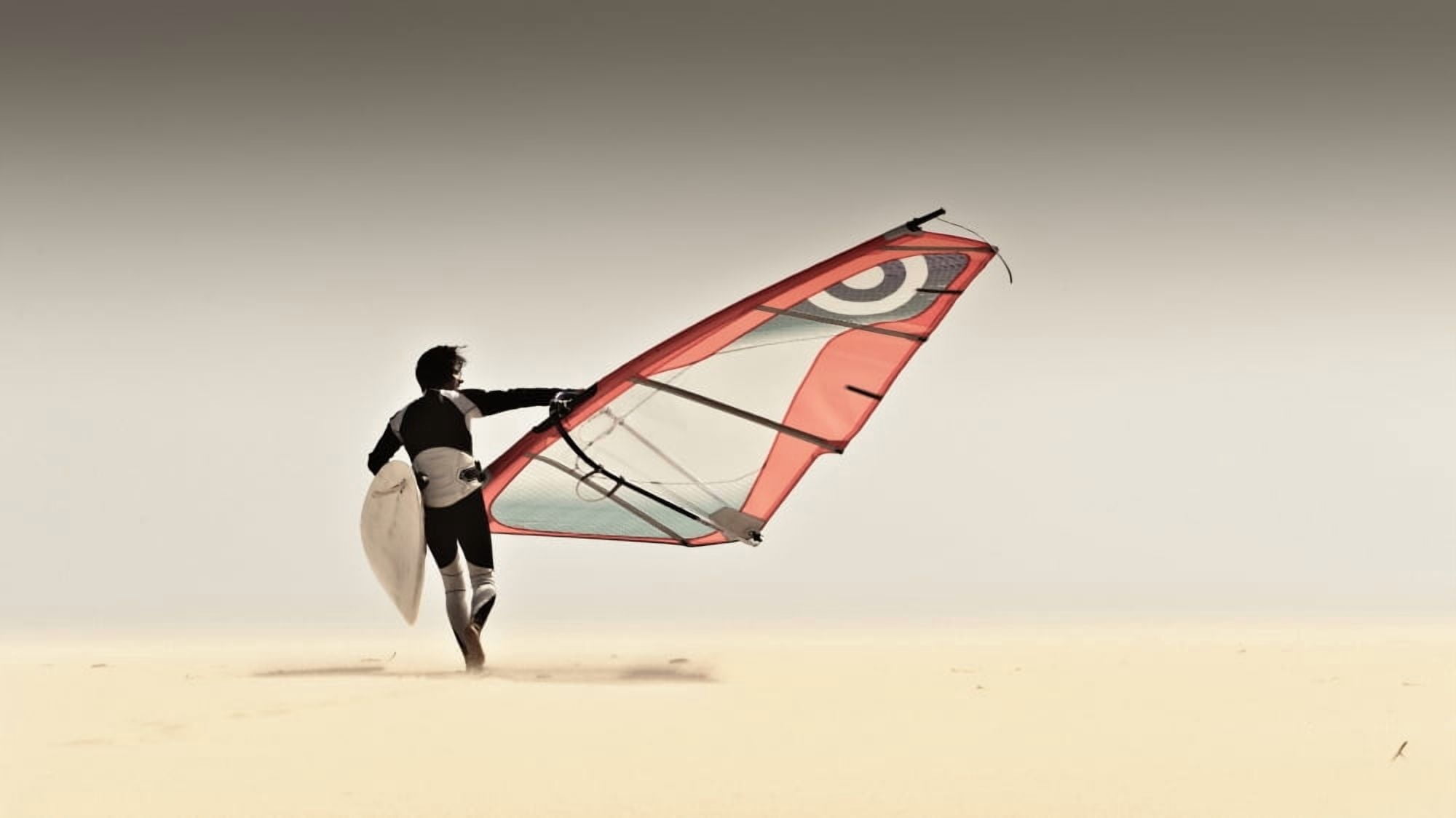 A Windsurfer Runs On The Sand Of Punta Paloma Beach With His Board Tarifa Cadiz Andalusia Spain Canvas Art - Ben Welsh Design Pics (20 x 11)