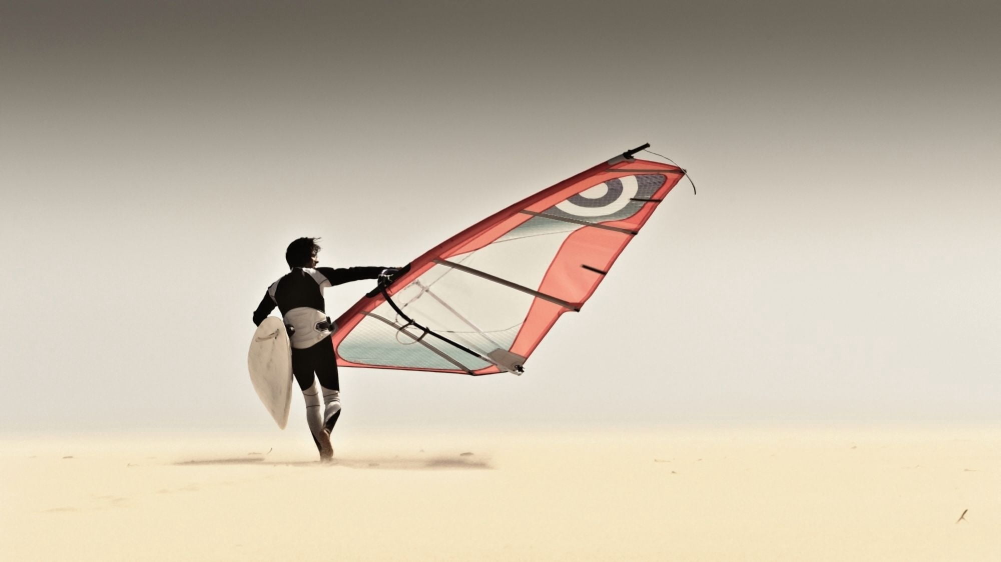 A Windsurfer Runs On The Sand Of Punta Paloma Beach With His Board Tarifa Cadiz Andalusia Spain Canvas Art - Ben Welsh Design Pics (40 x 22)
