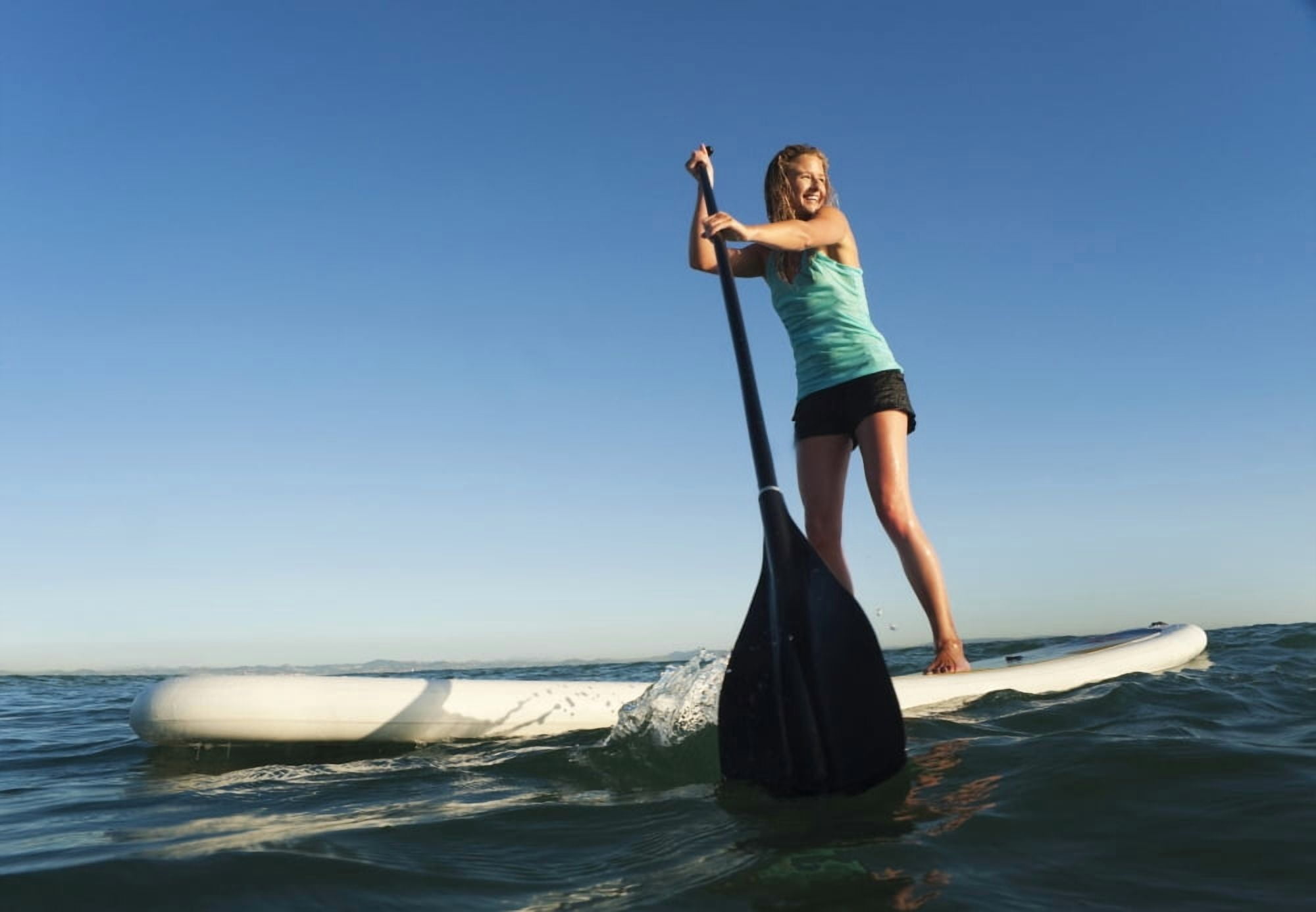 A Woman Paddling While Standing On A Surf Board Off Dos Mares Beach Tarifa Cadiz Andalusia Spain Canvas Art - Ben Welsh Design Pics (18 x 12)
