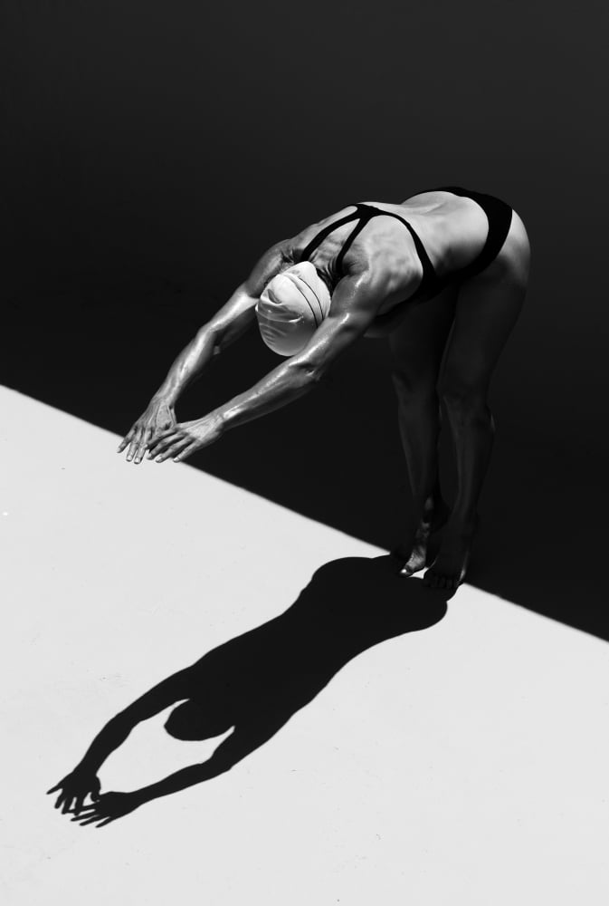 A Woman Prepares To Jump Backwards Off The Edge Of A Pool Into The Water Tarifa Cadiz Andalusia Spain Canvas Art - Ben Welsh Design Pics (24 x 36)
