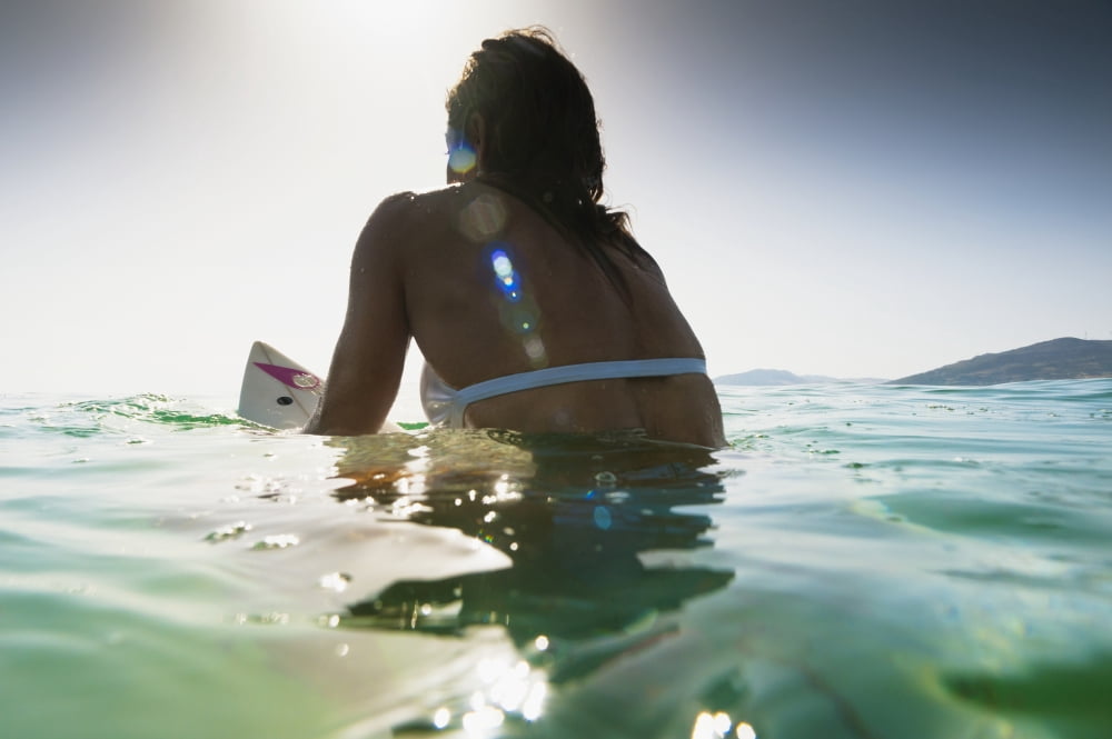 A Woman Sitting On A Surfboard In The Water Tarifa Cadiz Andalusia Spain Canvas Art - Ben Welsh Design Pics (19 x 12)
