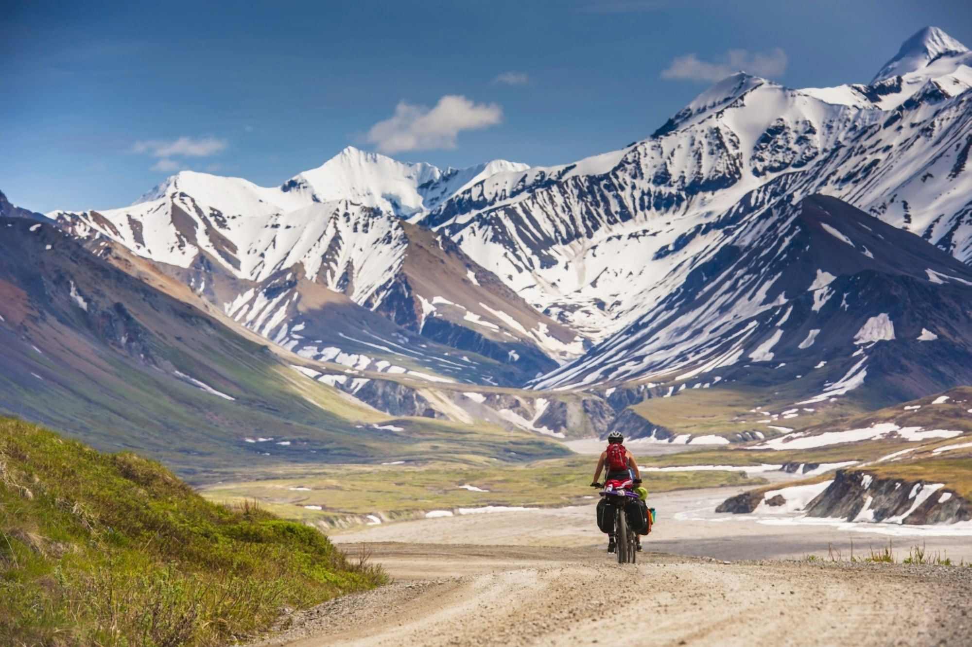 A Woman bicycle touring in Denali National Park Grassy Pass Southcentral Alaska Canvas Art - Michael Jones Design Pics (38 x 24)