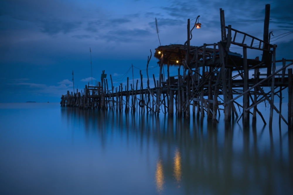 A Wooden Pier With Lights On It At Night Iceland Canvas Art - David DuChemin Design Pics (19 x 12)