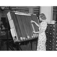 thumbnail image 1 of A Worker In The Social Security Board Records Office At The 'Visible Control' Rack. Each Card In This Rack Represents An, 1 of 1