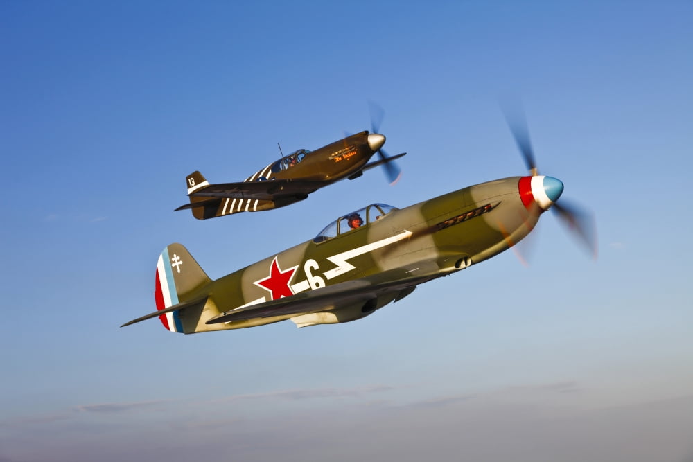 A Yakovlev Yak-9 fighter plane and a P-51A Mustang in flight Canvas Art - Scott GermainStocktrek Images (18 x 12)