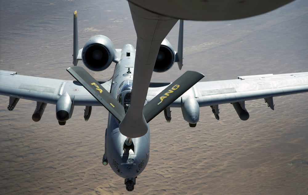 A boom operator refuels an A-10 Thunderbolt II Canvas Art - Stocktrek Images (36 x 23)