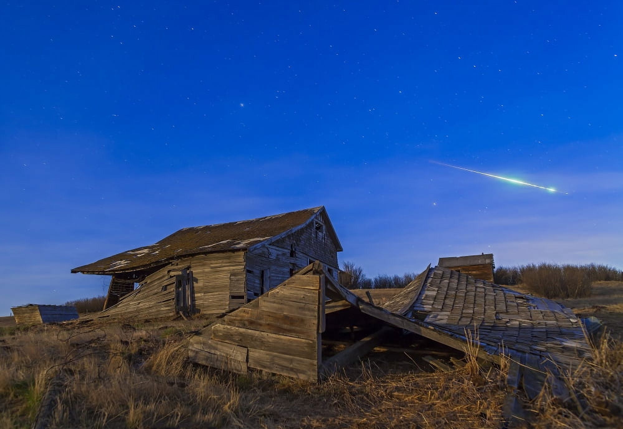 A bright bolide meteor breaking up as it enters the atmosphere Canvas Art - Alan DyerStocktrek Images (17 x 12)